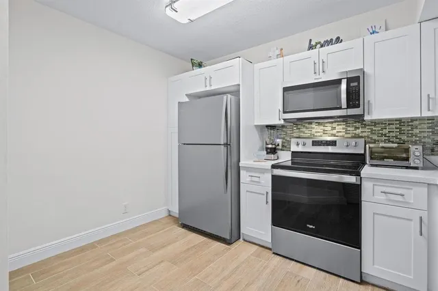 $258,000 | 8851 Wiles Road, Unit 305, Coral Springs, FL 33067