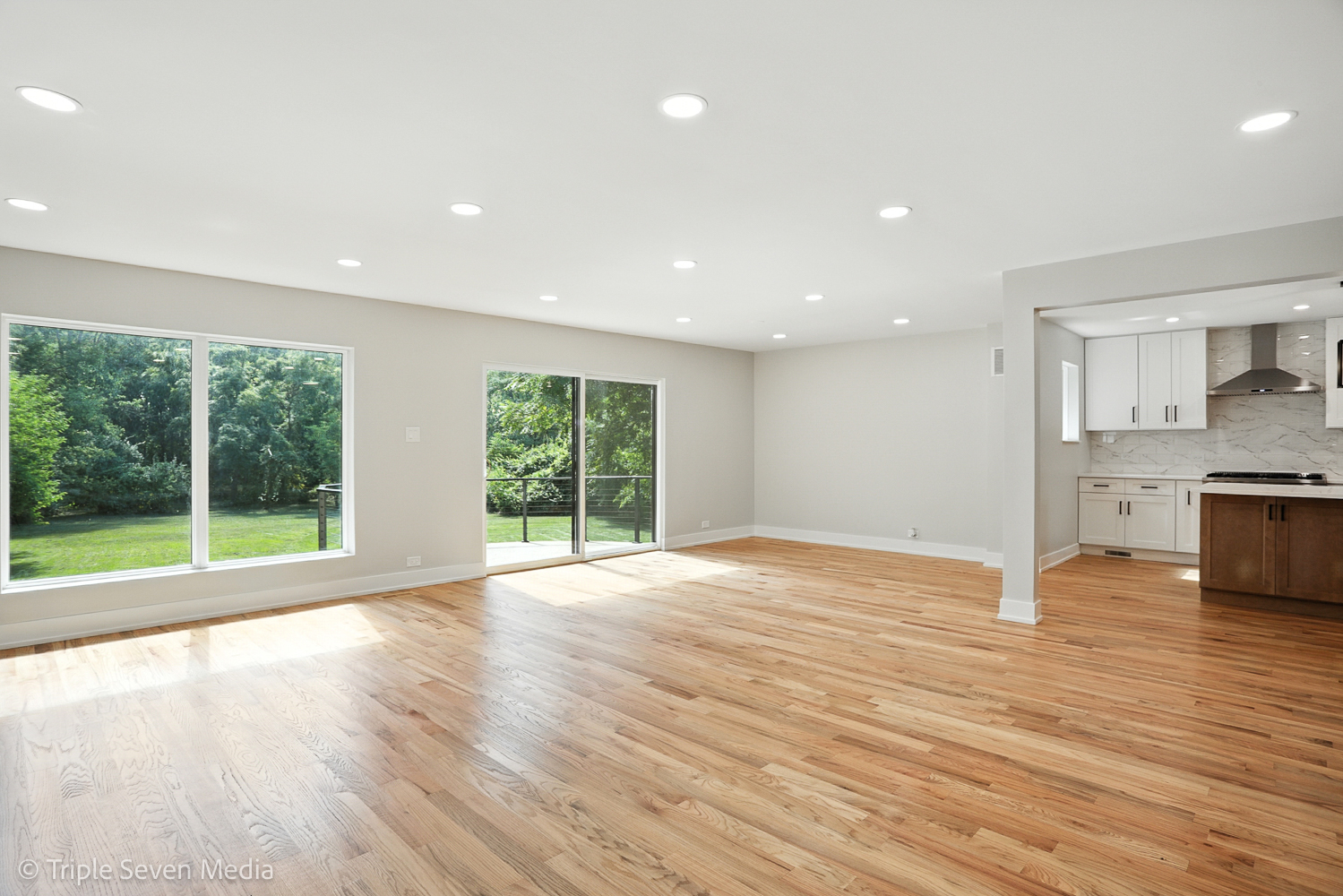 18801 Ruth Drive Mokena, IL 60448 - Photo 11 of 35 a view of empty room with wooden floor and windows