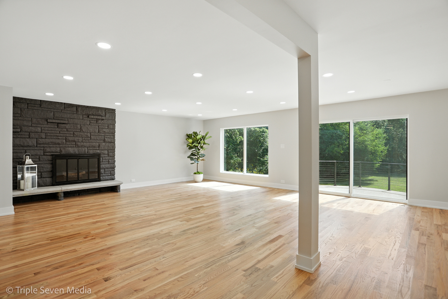 18801 Ruth Drive Mokena, IL 60448 - Photo 13 of 35 a view of an empty room with wooden floor and a fireplace