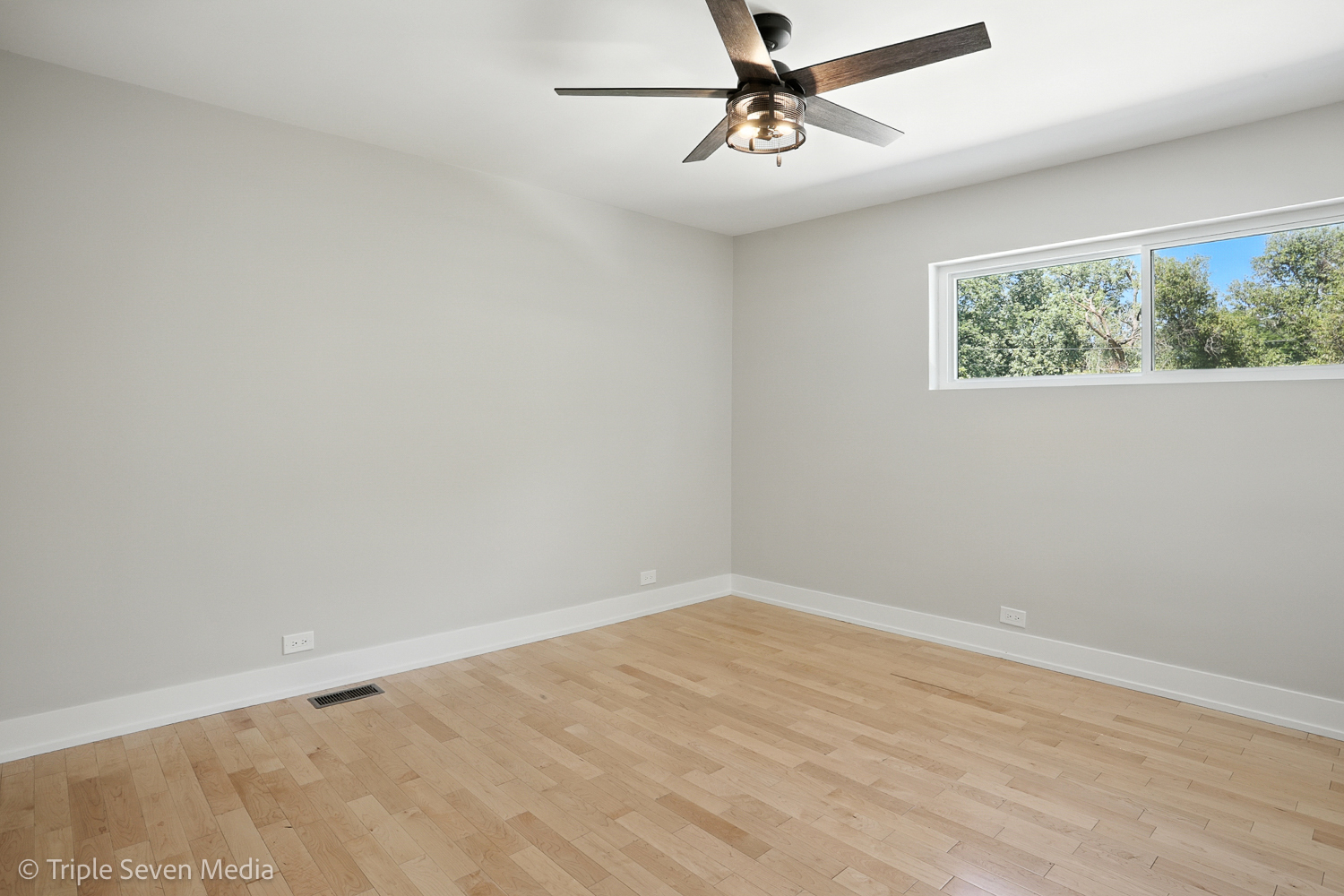 18801 Ruth Drive Mokena, IL 60448 - Photo 23 of 35 an empty room with a window and a ceiling fan
