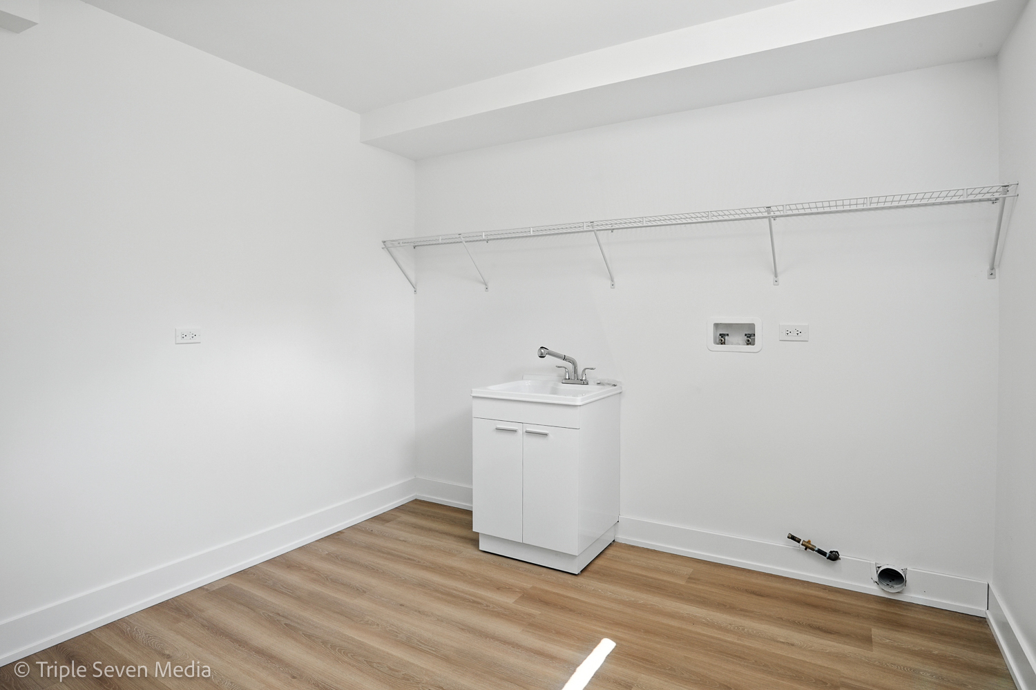 18801 Ruth Drive Mokena, IL 60448 - Photo 33 of 35 a view of a utility room with closet and wooden floor