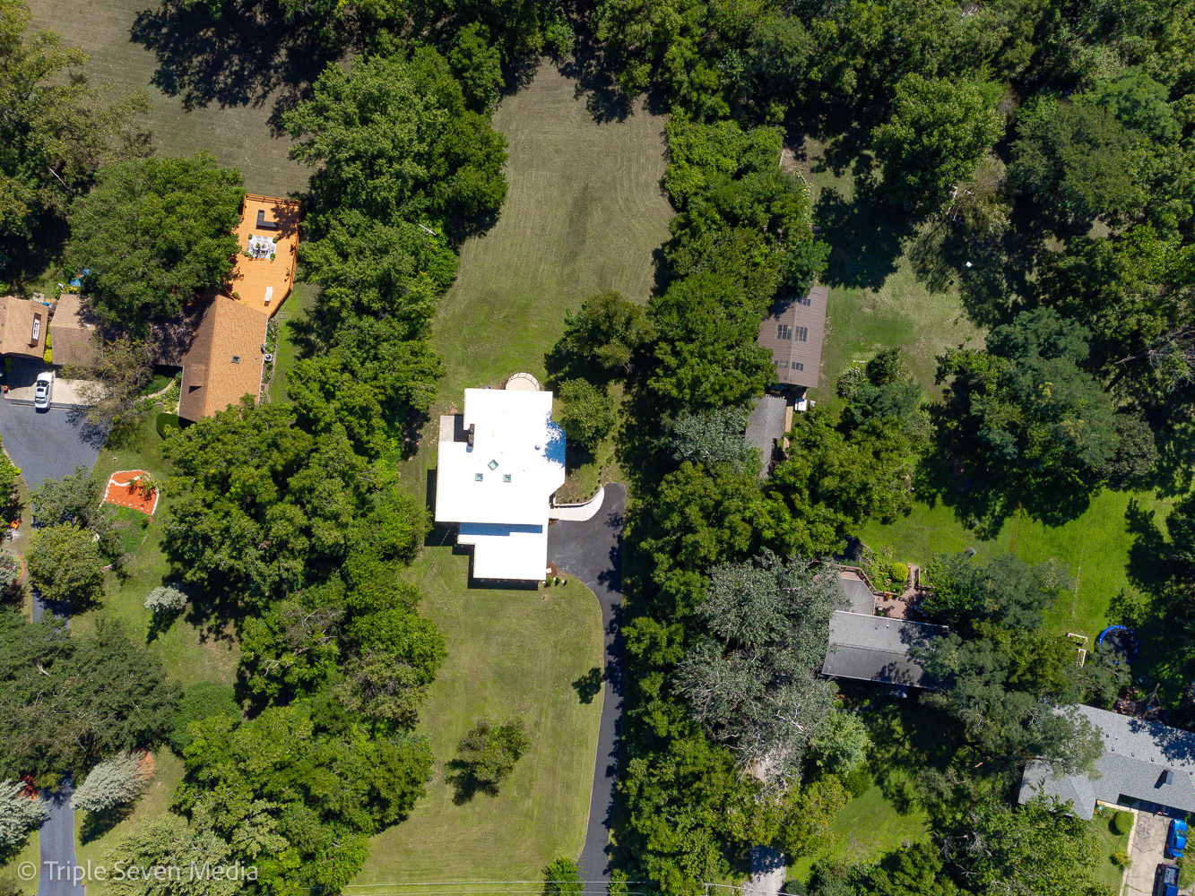 18801 Ruth Drive Mokena, IL 60448 - Photo 4 of 35 an aerial view of a house with a yard and lake view