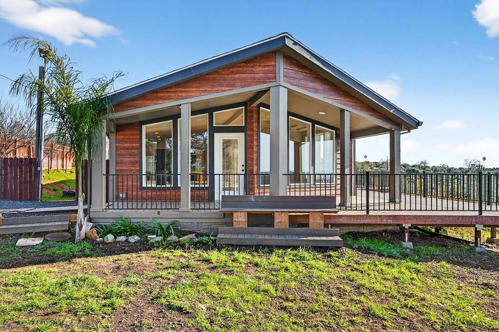235 Grimont Road Oroville, CA 95966 - Photo 2 of 68 a front view of a house with a porch