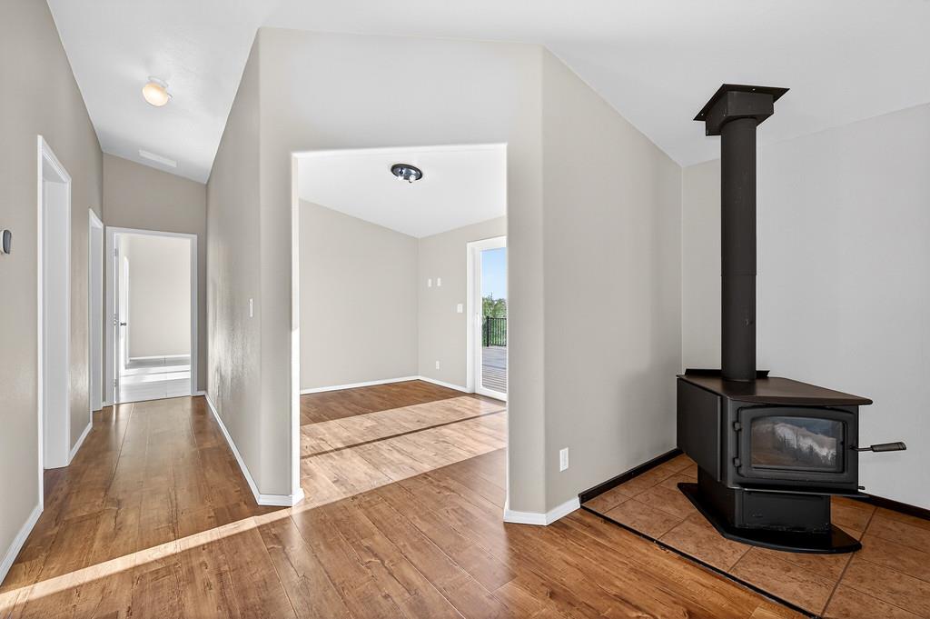 235 Grimont Road Oroville, CA 95966 - Photo 26 of 68 a view of a hallway with wooden floor and staircase