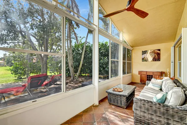 a backyard of a house with seating space