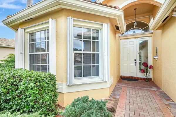 a view of a house with a large window