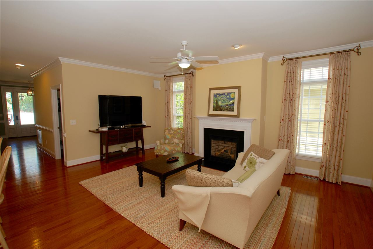 1228 North Blount Street Raleigh, NC 27604 - Photo 6 of 25 The family room is the center of attention with a direct vent gas log fireplace and plenty of space for comfortable seating. Family Room