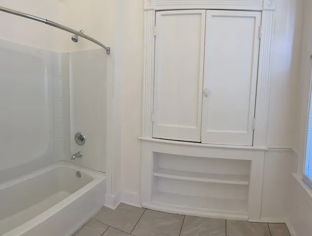 a bathroom with a bathtub