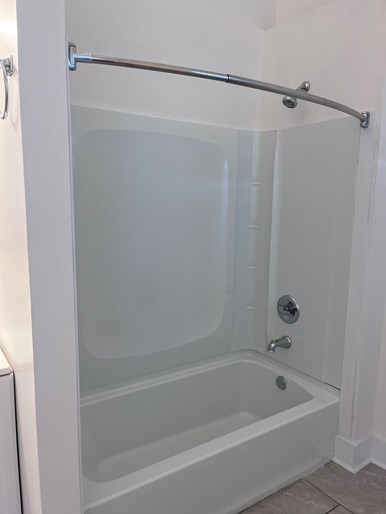 1301 18th Street, Unit A Columbus, GA 31901 - Photo 19 of 21 a bathroom with a shower and a bath tub