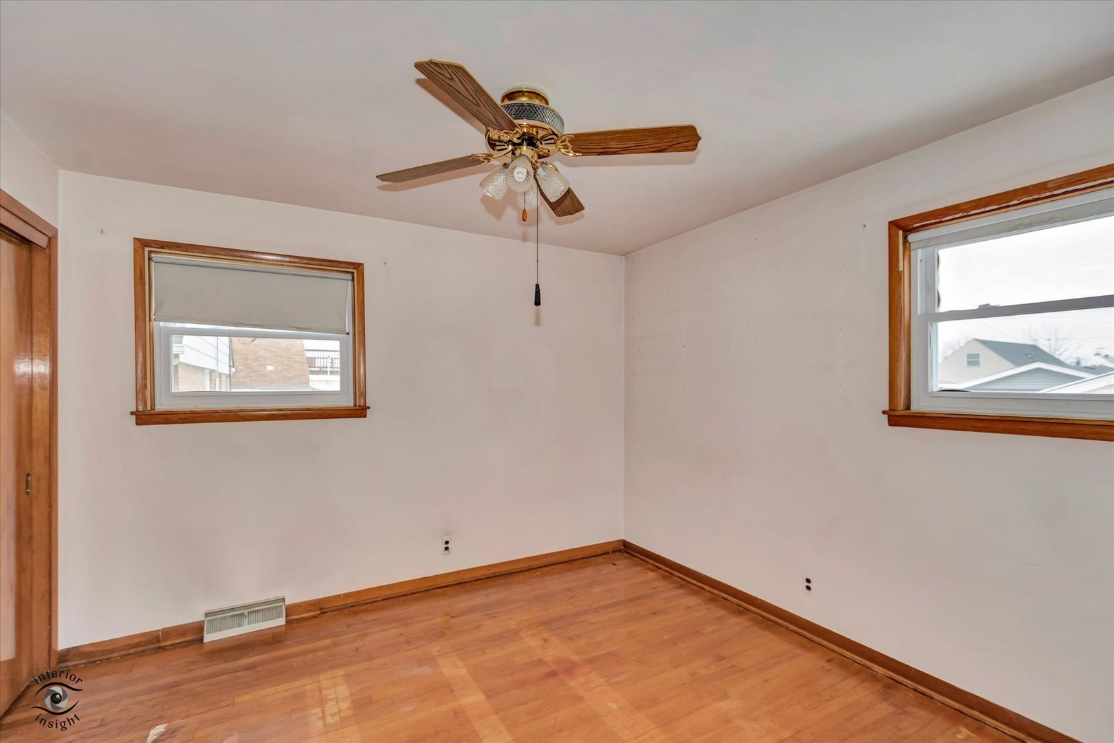 6049 South Mobile Avenue Chicago, IL 60638 - Photo 12 of 26 a view of empty room with wooden floor