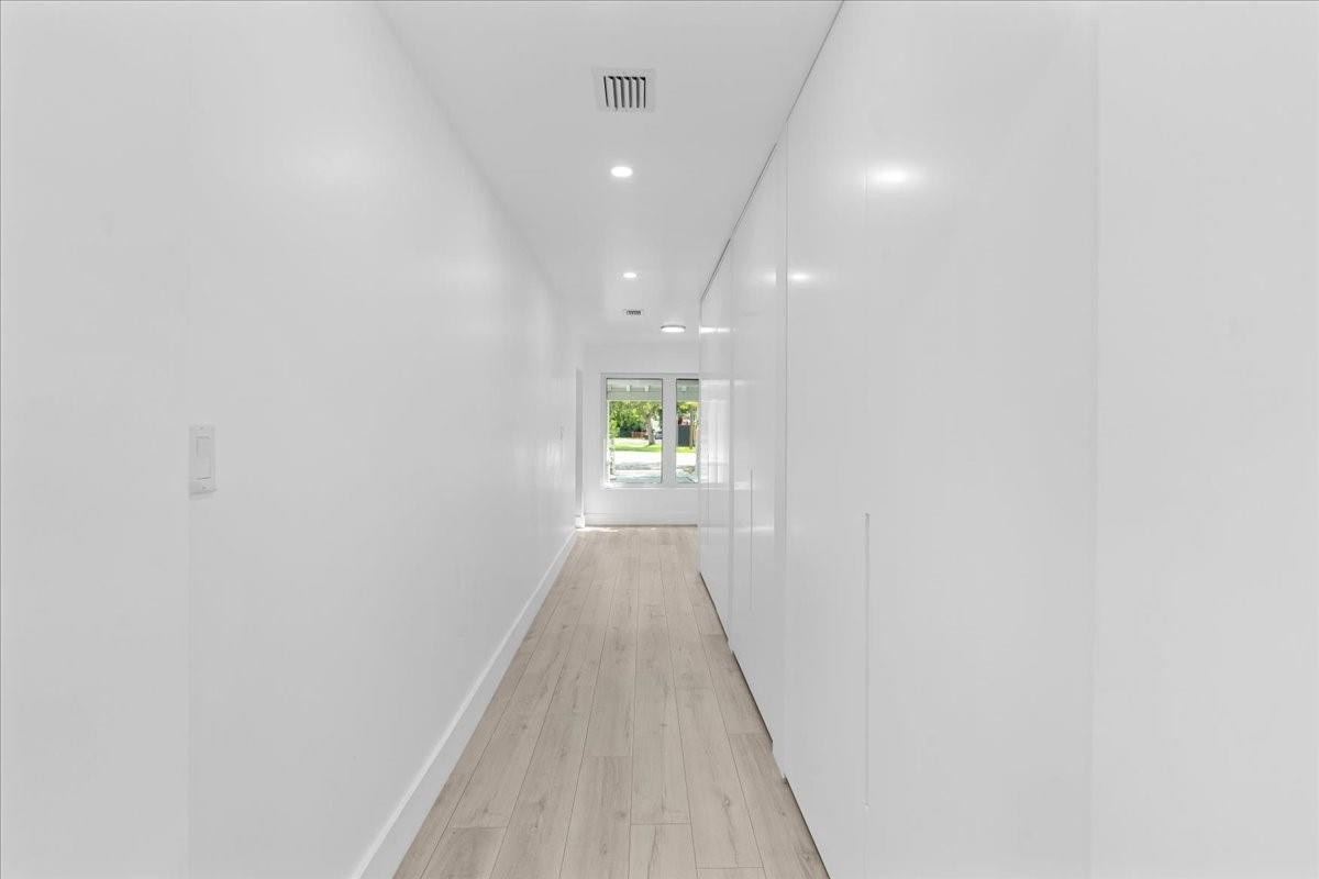 257 Southwest 32nd Road Miami, FL 33129 - Photo 20 of 60 Laundry Room behind custom doors