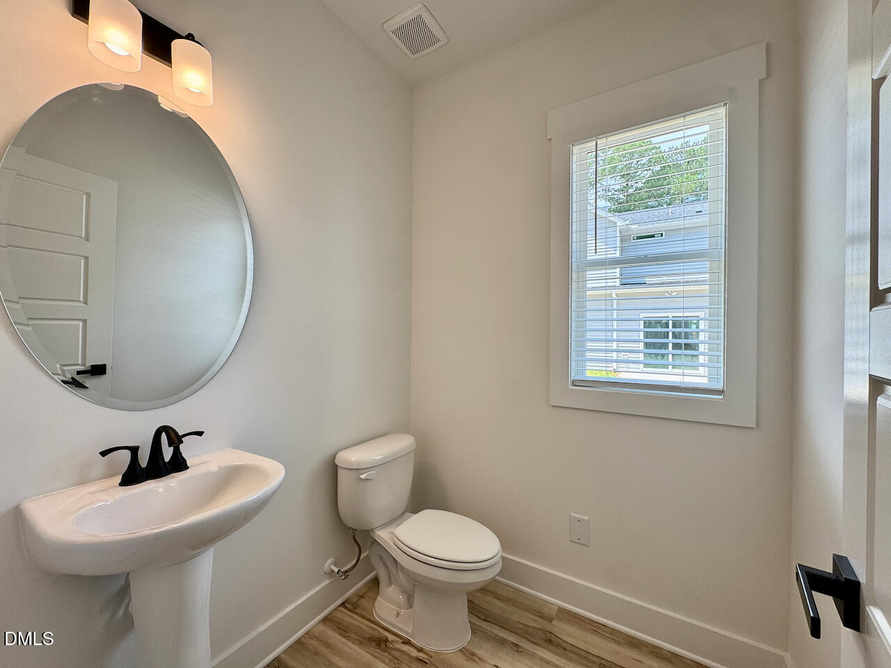 218 George Street Four Oaks, NC 27524 - Photo 13 of 33 Main-Level Powder Room