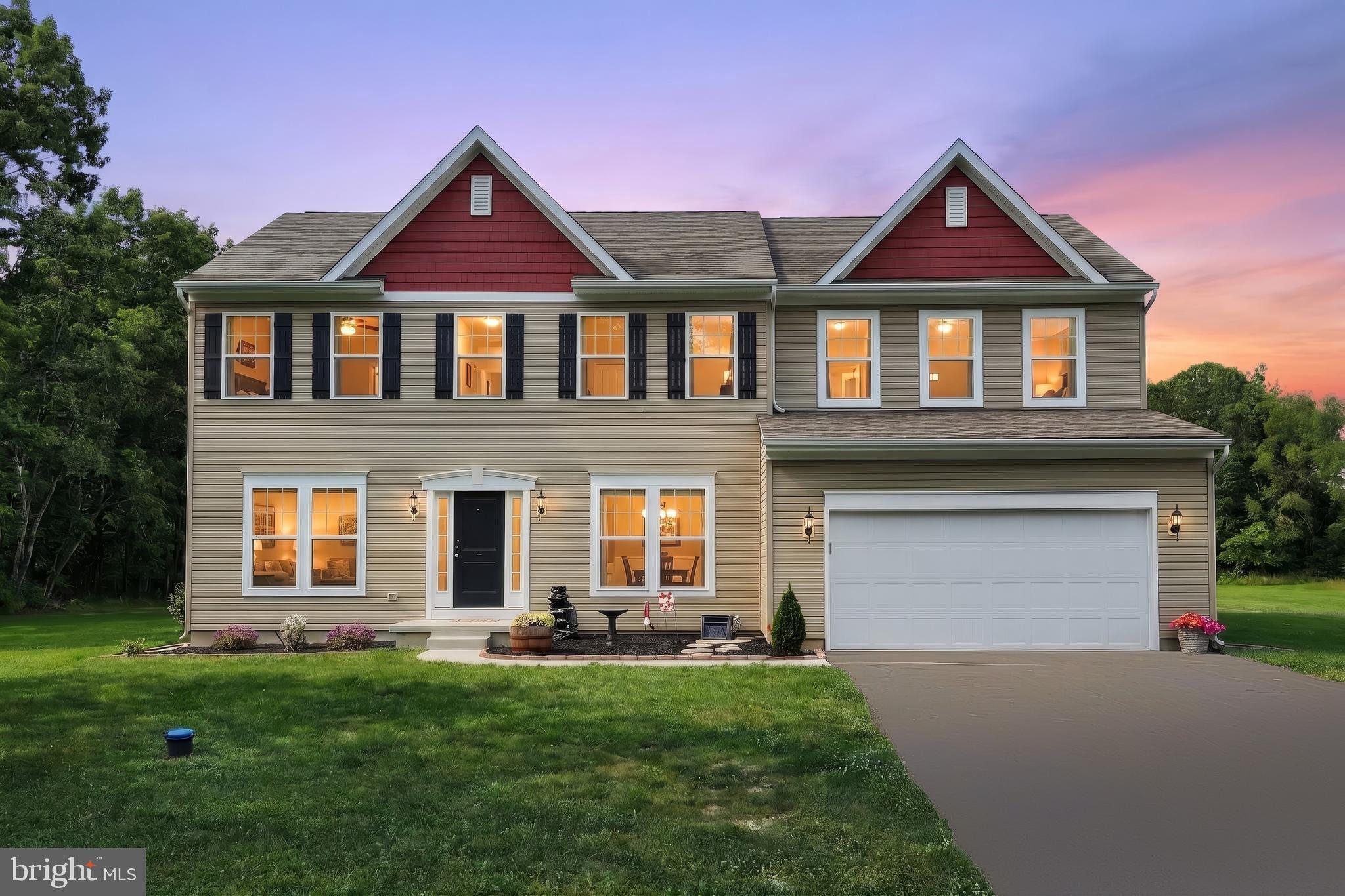 2741 Cold Springs Road Orrtanna, PA 17353 - Photo 1 of 52 a front view of a house with a yard and garage