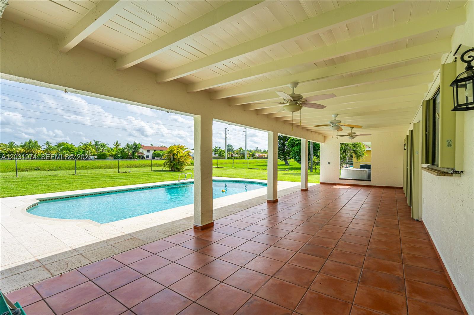 9380 Southwest 134th Street Miami, FL 33176 - Photo 13 of 36 covered patio w access to cabana bath