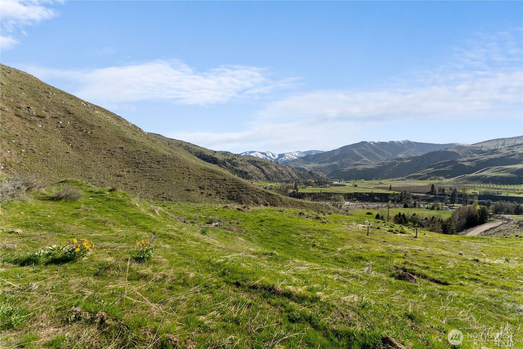 6 Cowboy Road Pateros, WA 98846 - Photo 11 of 38 a view of a lake with mountains in the background