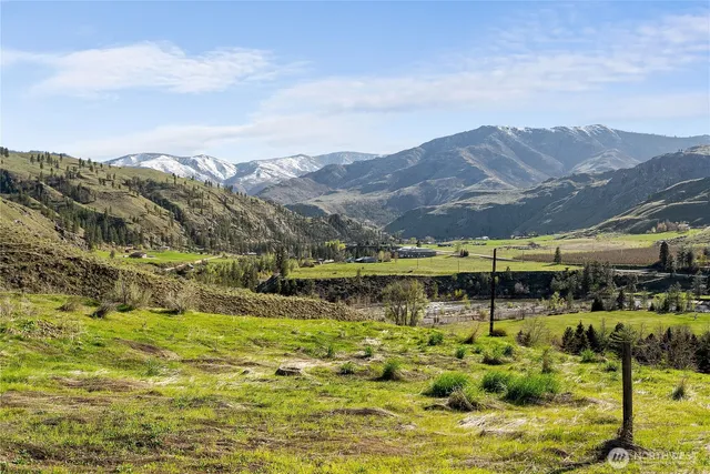 a view of a lake with mountains in the background