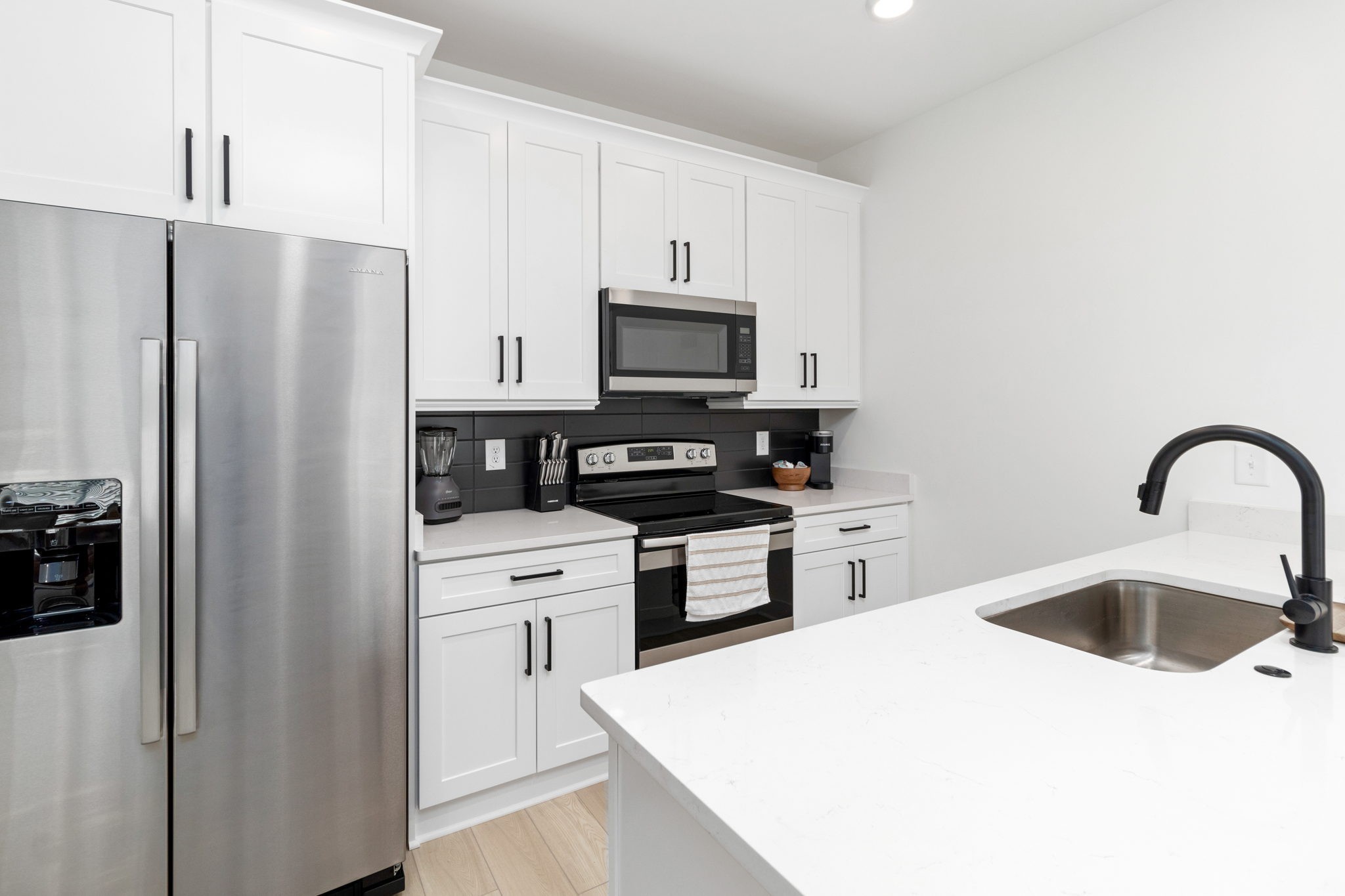 725 Hornbuckle Road, Unit B2 Clarksville, TN 37043 - Photo 11 of 31 a kitchen with stainless steel appliances granite countertop a refrigerator sink and stove