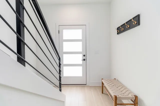 a spacious bedroom with a bed and walk in closet