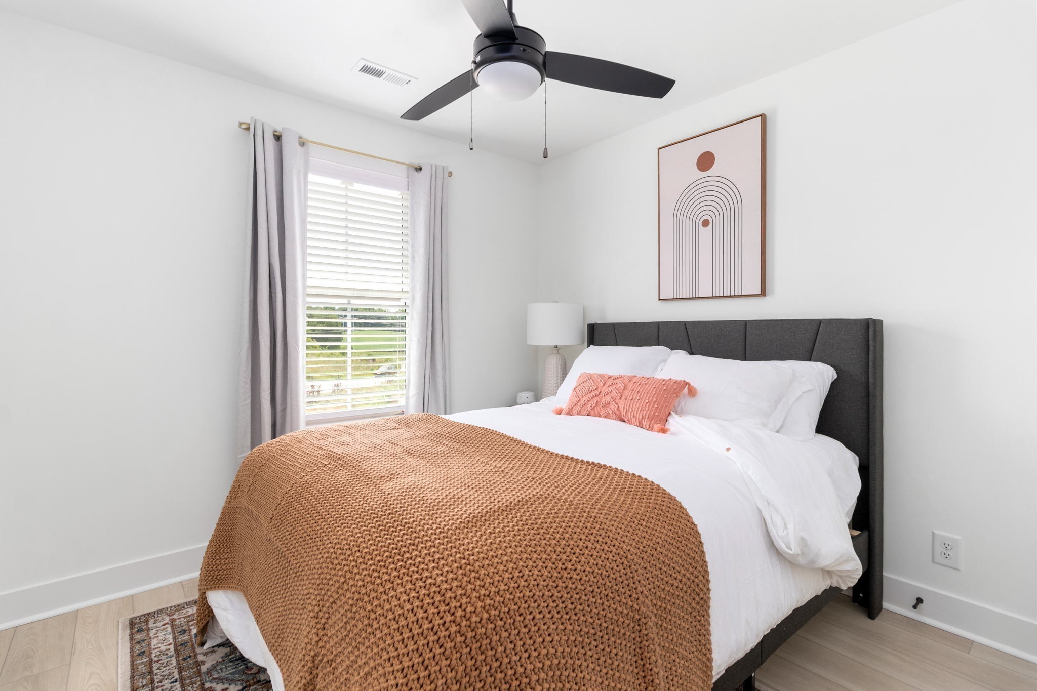 725 Hornbuckle Road, Unit B2 Clarksville, TN 37043 - Photo 24 of 31 a large bed sitting in a bedroom next to a window