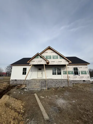 a front view of a house with yard