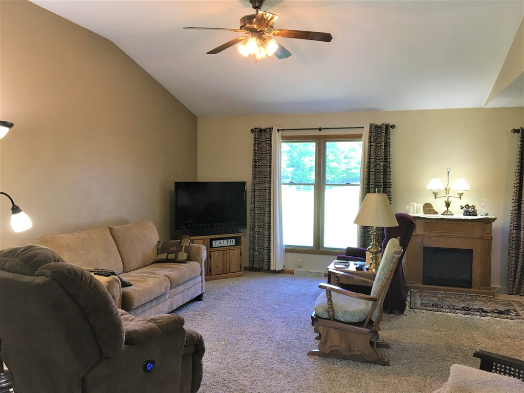 23273 Fry Road Venango, PA 16440 - Photo 38 of 74 a living room with furniture and a flat screen tv