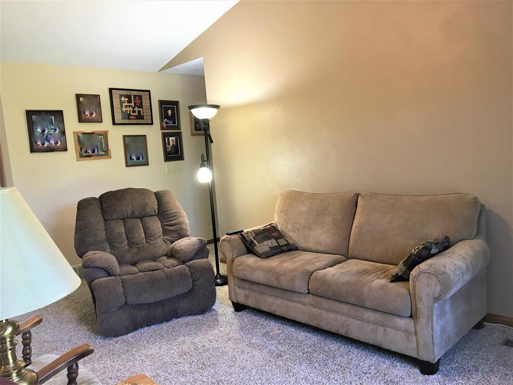 23273 Fry Road Venango, PA 16440 - Photo 39 of 74 a living room with furniture and painting on the wall