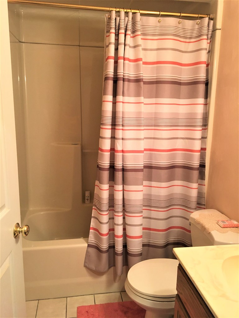 23273 Fry Road Venango, PA 16440 - Photo 52 of 74 a bathroom with a sink a toilet and shower