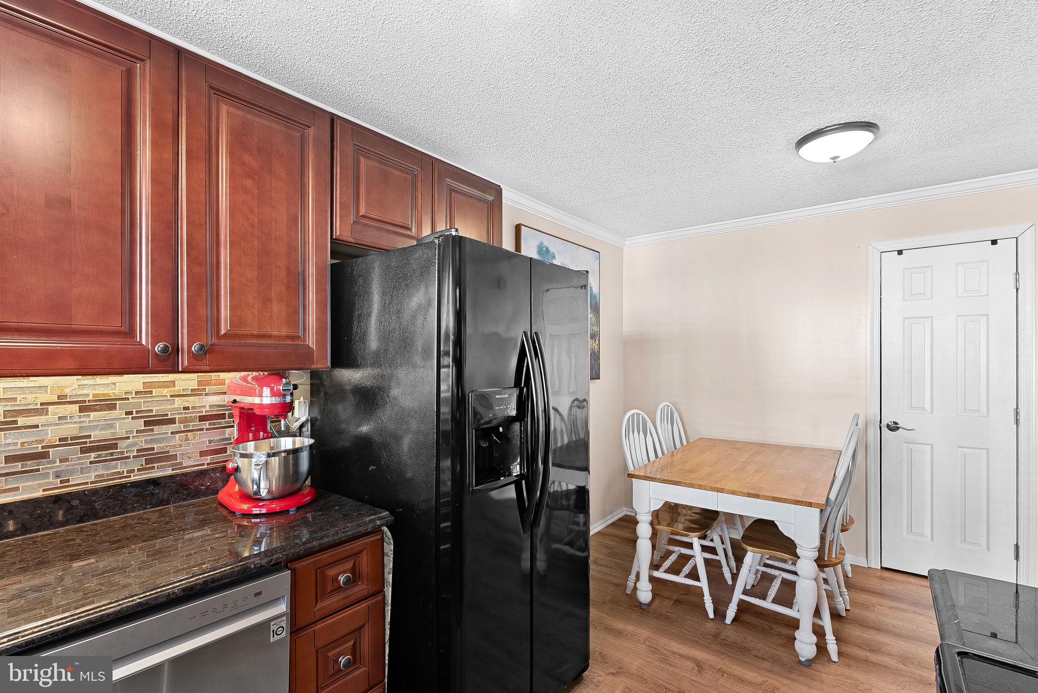 1115 Huntmaster Terrace Northeast, Unit 202 Leesburg, VA 20176 - Photo 17 of 33 Full sized refrigerator.