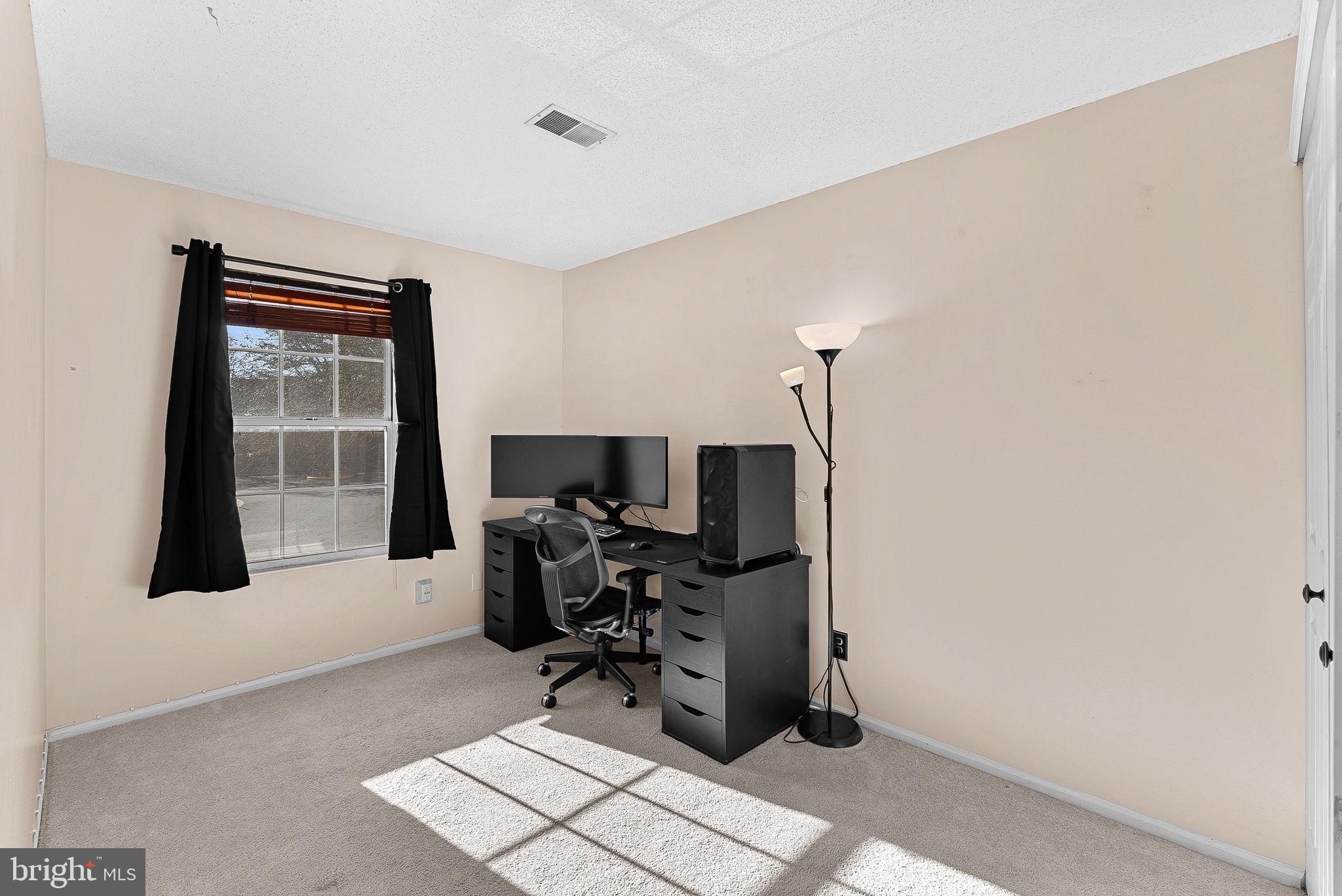 1115 Huntmaster Terrace Northeast, Unit 202 Leesburg, VA 20176 - Photo 27 of 33 Bedroom 2.