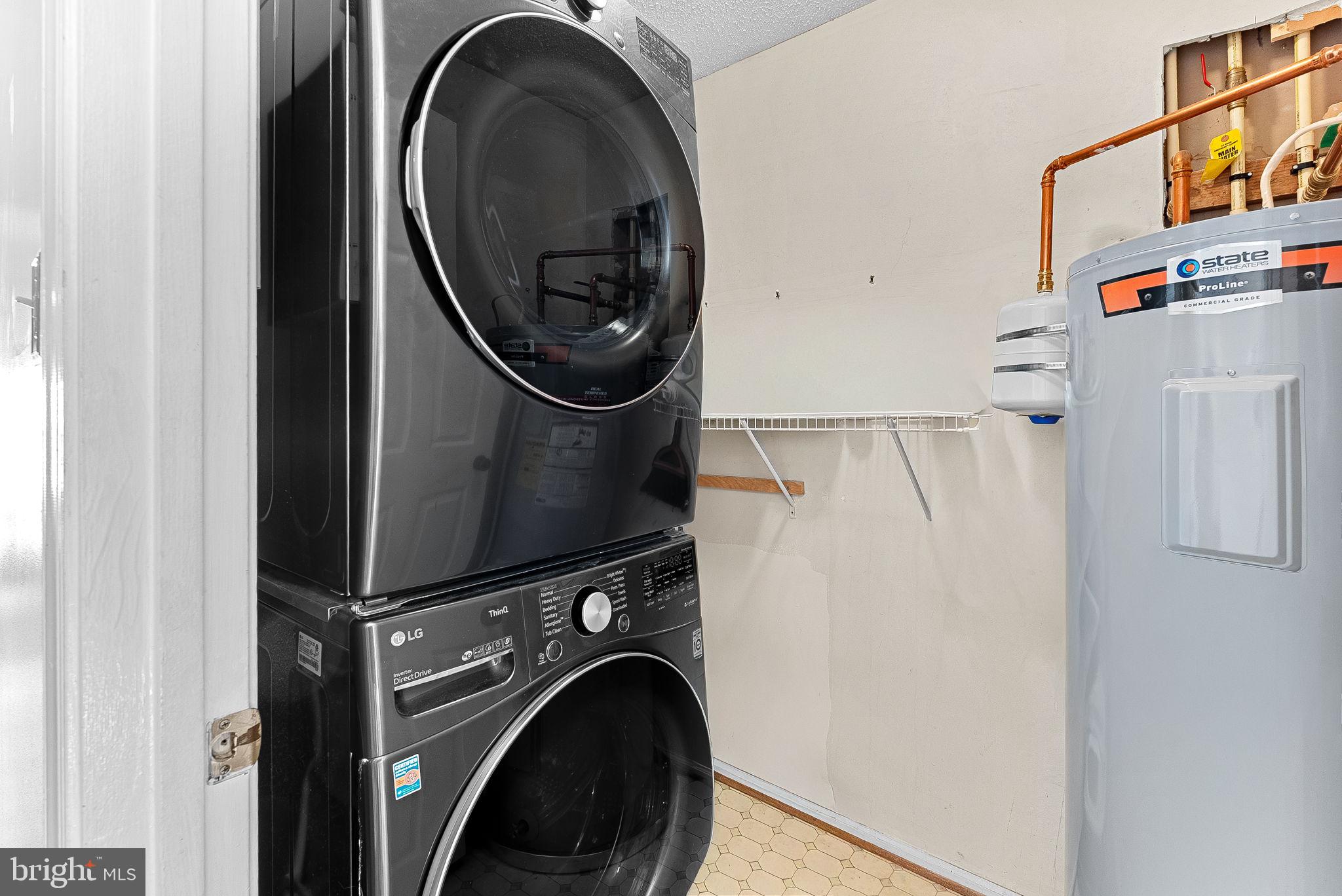 1115 Huntmaster Terrace Northeast, Unit 202 Leesburg, VA 20176 - Photo 30 of 33 Convenient laundry room.