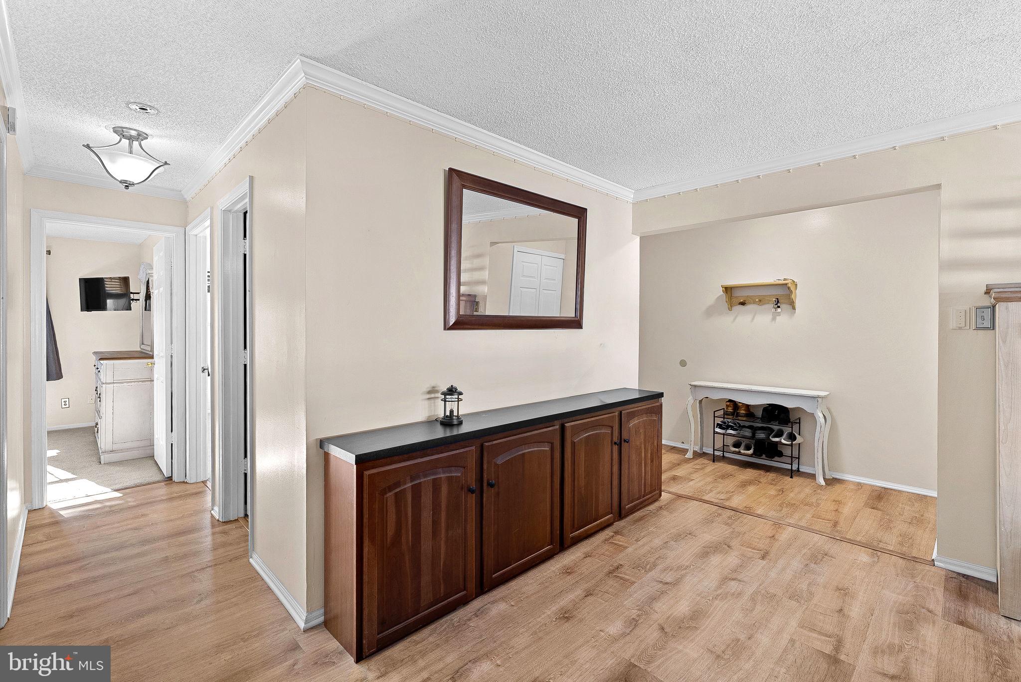 1115 Huntmaster Terrace Northeast, Unit 202 Leesburg, VA 20176 - Photo 4 of 33 Lovely LVP flooring throughout main living area.