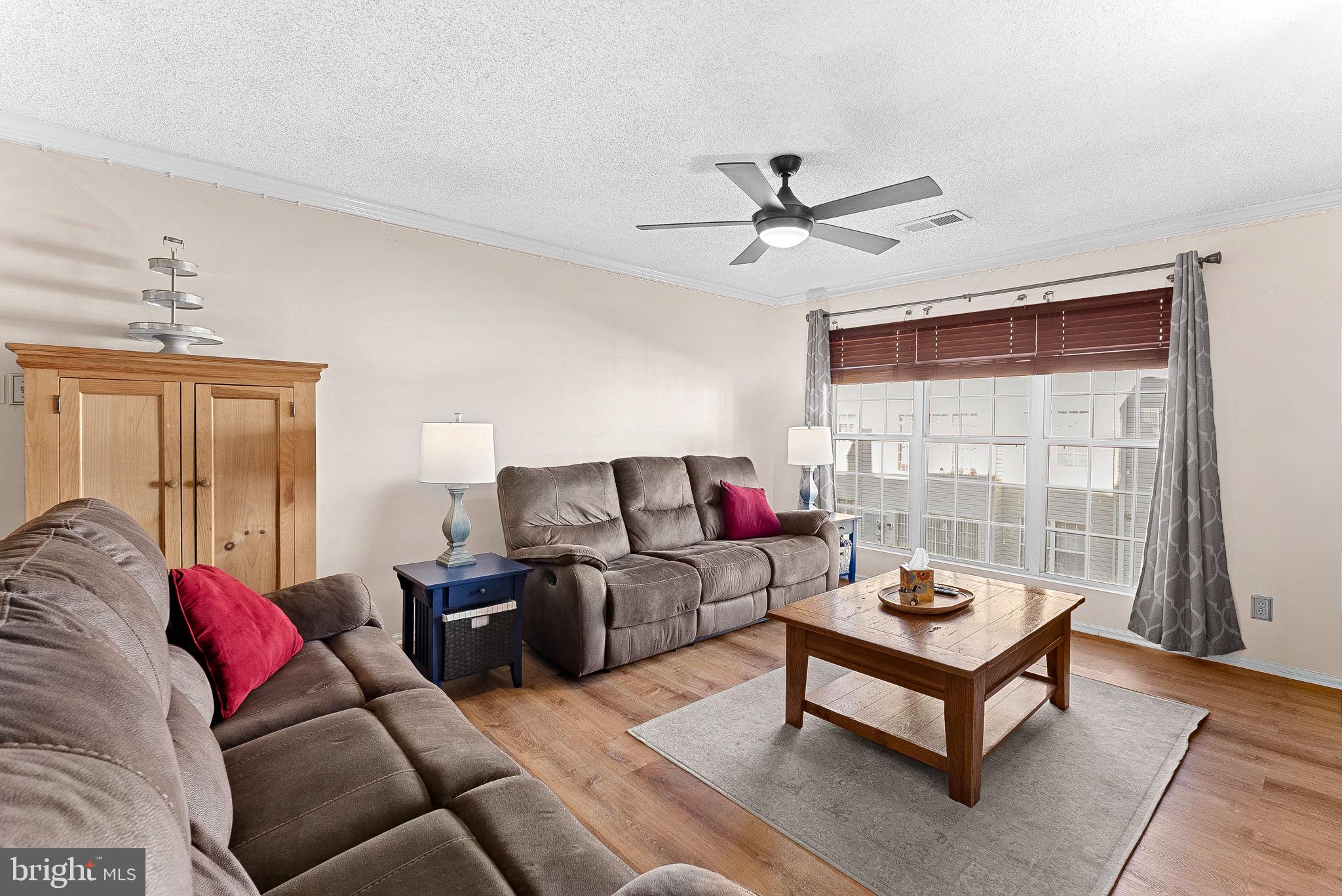 1115 Huntmaster Terrace Northeast, Unit 202 Leesburg, VA 20176 - Photo 6 of 33 Spacious family room area.