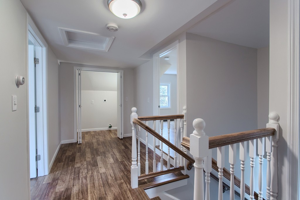 18 South Martin Road Amesbury, MA 01913 - Photo 23 of 30 a view of a hallway with wooden floor and entryway