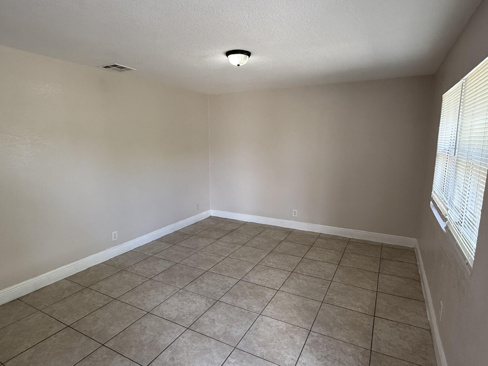 2830 Avenue South, Unit B3 Riviera Beach, FL 33404 - Photo 1 of 8 Living Room