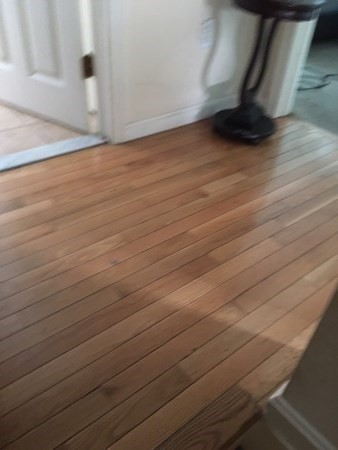 997 Middlesex Street, Unit 3 Lowell, MA 01851 - Photo 8 of 11 a view of a room with wooden floor