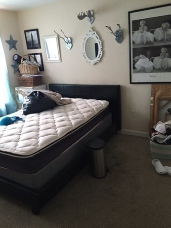 997 Middlesex Street, Unit 3 Lowell, MA 01851 - Photo 9 of 11 a bathroom with a sink and a mirror