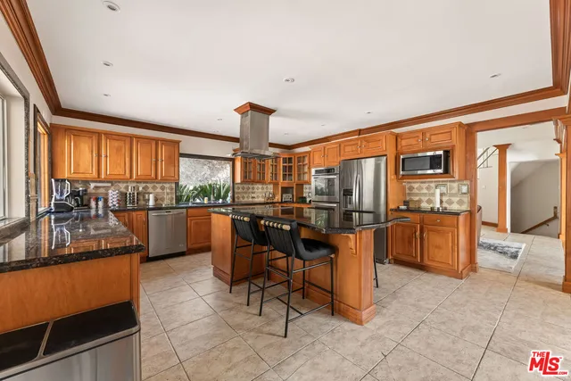 a large room with a table and chairs