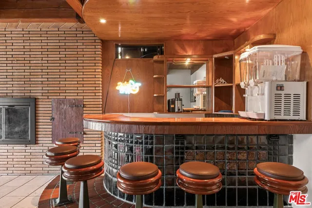 swimming pool view with a garden space