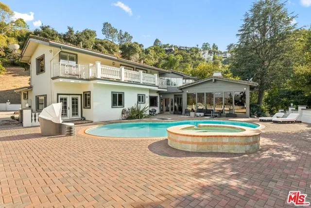a balcony view with outdoor space