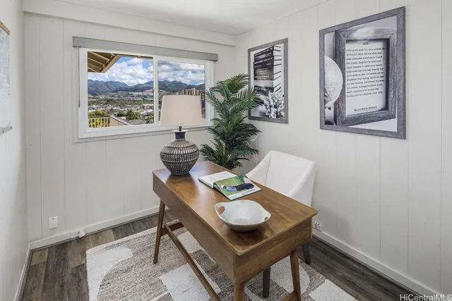 a view of a workspace with furniture