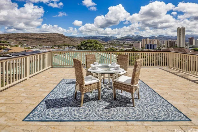 a view of a terrace with wooden floor