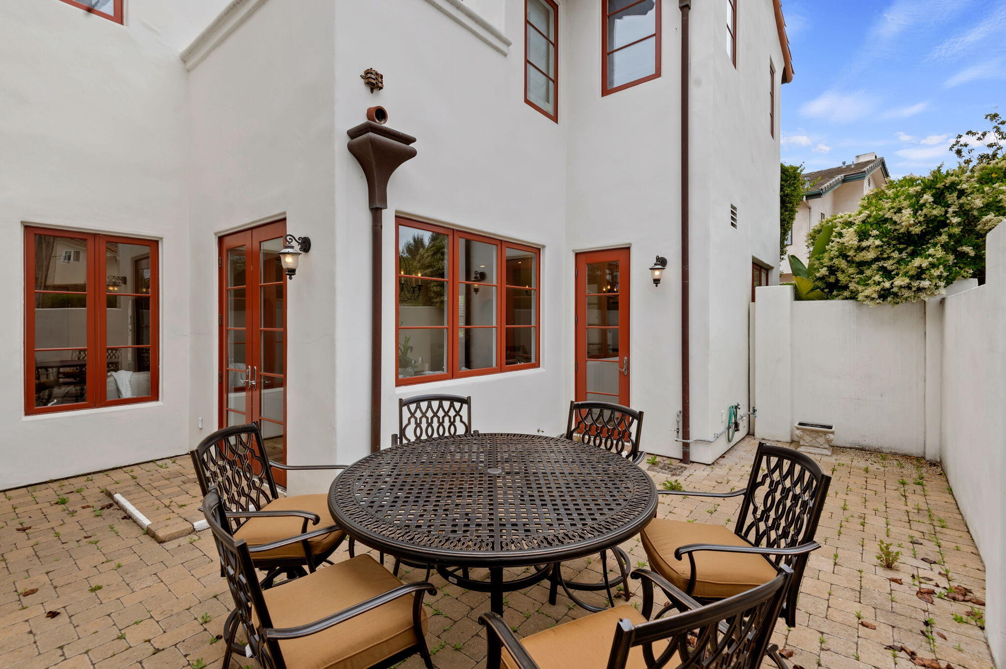 4366 Modoc Road Santa Barbara, CA 93110 - Photo 12 of 23 a view of a house with backyard and sitting area