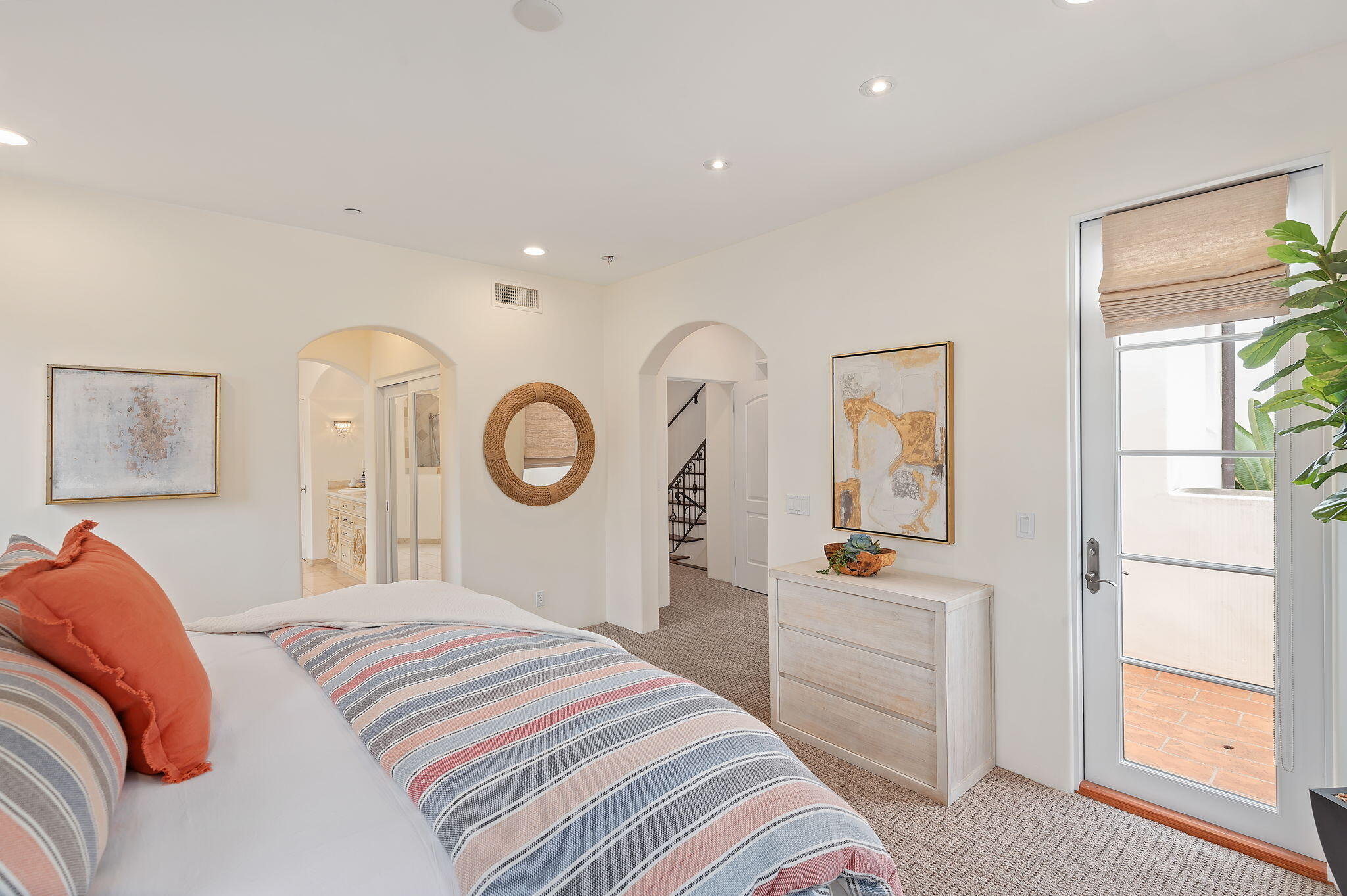 4366 Modoc Road Santa Barbara, CA 93110 - Photo 14 of 23 a bedroom with a bed and a mirror on the dresser
