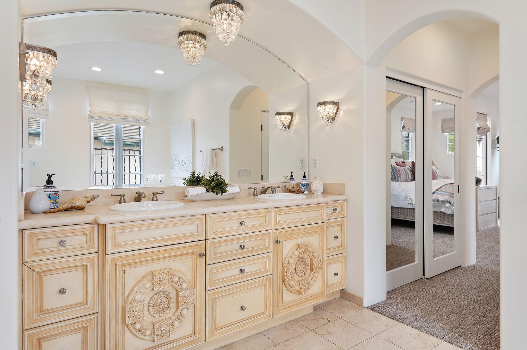 4366 Modoc Road Santa Barbara, CA 93110 - Photo 16 of 23 a spacious bathroom with a granite countertop sink a mirror a vanity and a shower