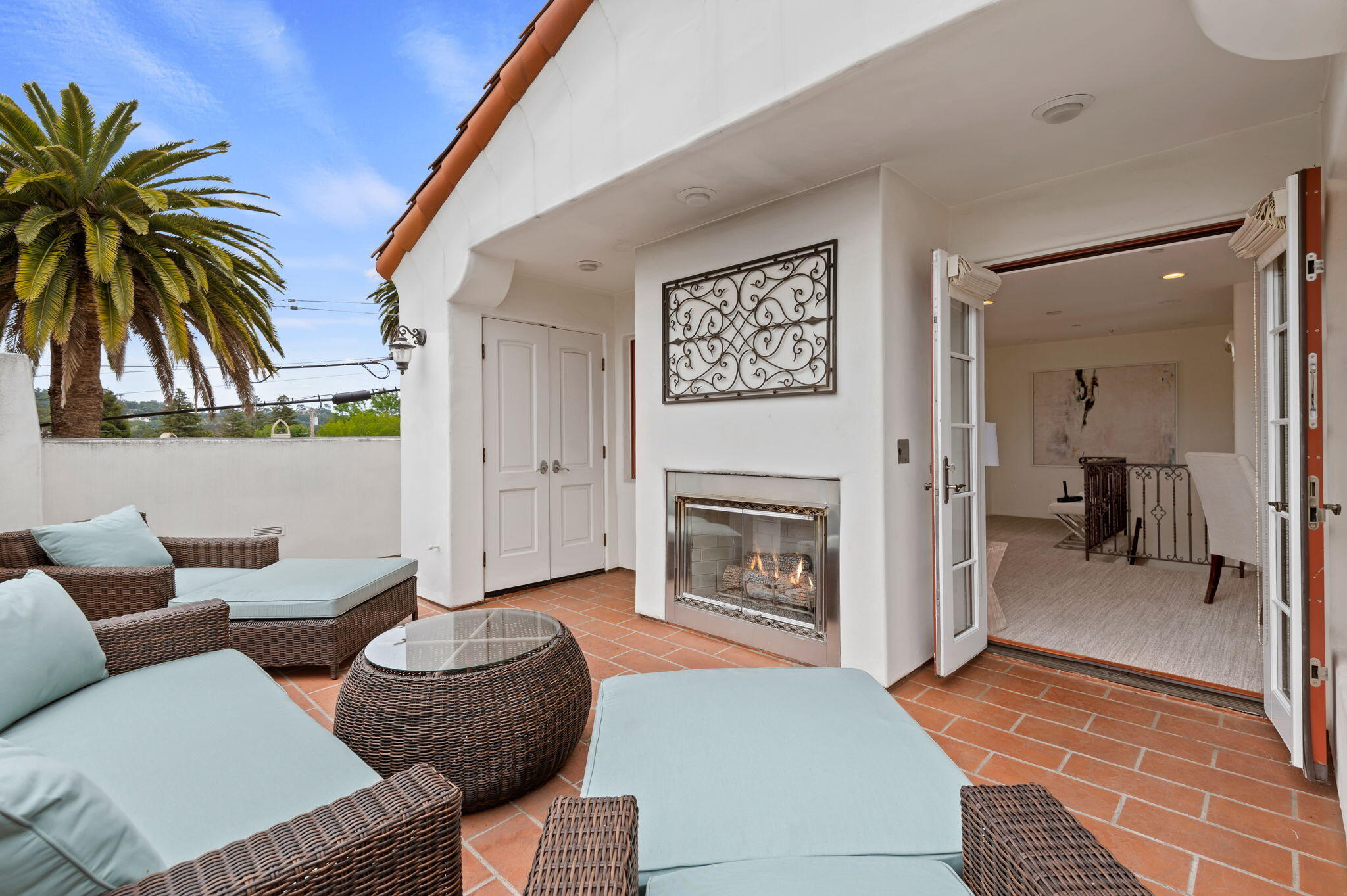 4366 Modoc Road Santa Barbara, CA 93110 - Photo 23 of 23 a living room with furniture and a fireplace