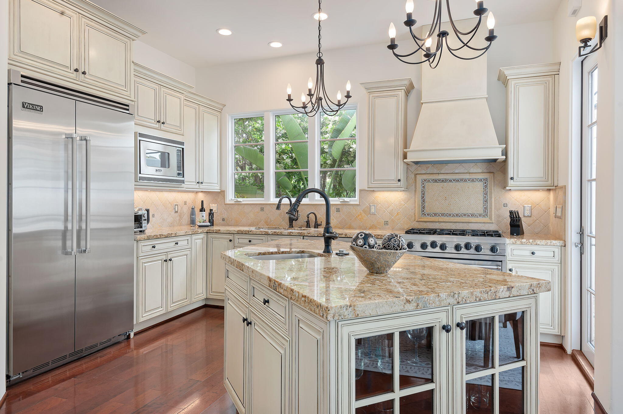 4366 Modoc Road Santa Barbara, CA 93110 - Photo 7 of 23 a kitchen with stainless steel appliances granite countertop a sink stove and refrigerator