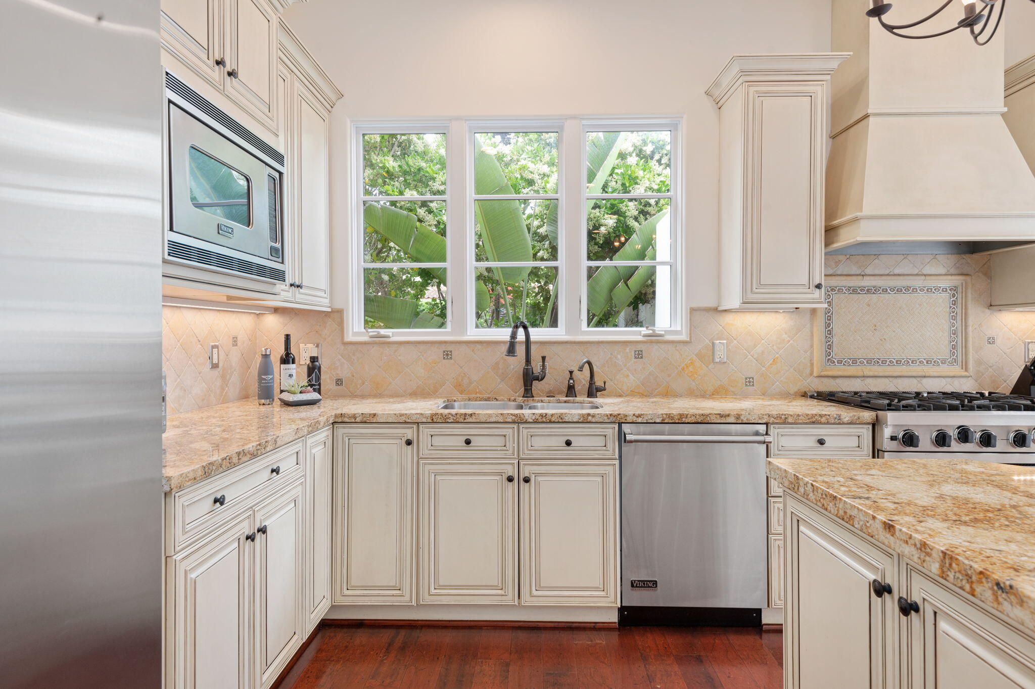 4366 Modoc Road Santa Barbara, CA 93110 - Photo 8 of 23 a kitchen with cabinets appliances a sink and a window