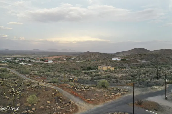 an aerial view of residential house and green space