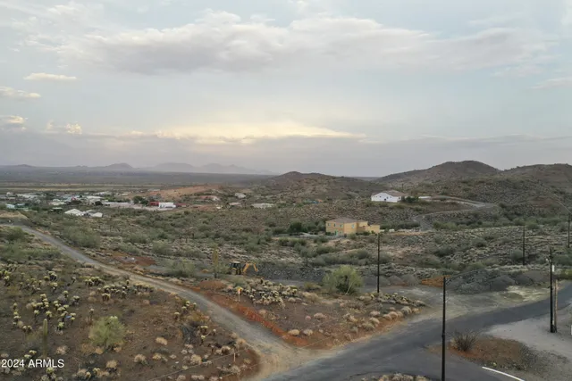 an aerial view of residential house and green space