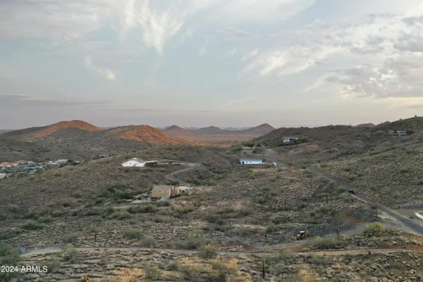 a view of a city with mountains in the background